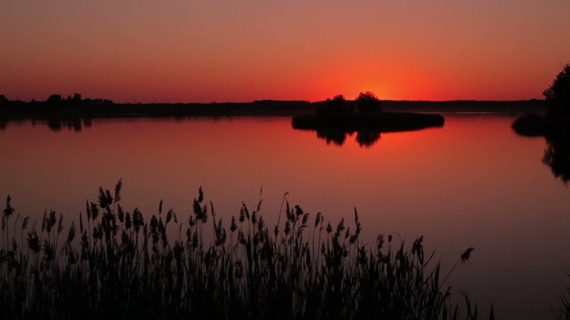 Sunset on the lake. Romantic evening