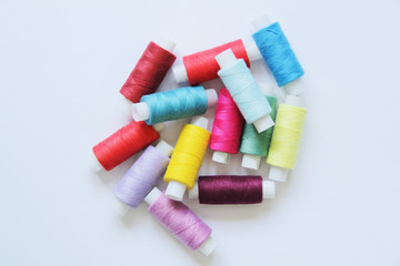 Fototapeta na wymiar Sewing colored threads
