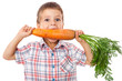 Little boy biting the carrot