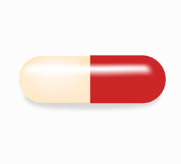 Red and white capsule pill on white