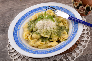 Tortellini with basil pesto and cheese
