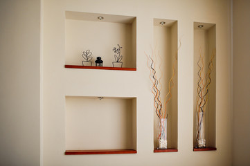 wall in a room with recesses for decoration