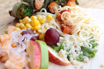 Pasta spaghetti with salad mix fruit and vegetables