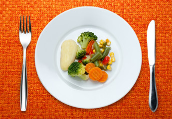 Fried vegetables on the plate