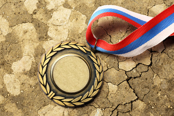 Metal medal with tricolor ribbon