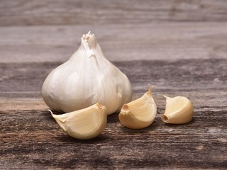 Garlic on wooden background