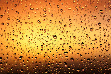 Cold rain drops on window