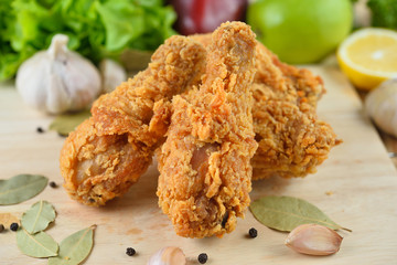 fried chicken isolated on wooden  background