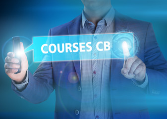 Businessman presses button courses cb on virtual screens. Busine