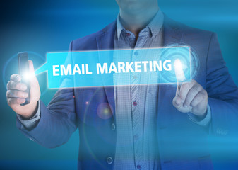 Businessman presses button email marketing on virtual screens. B