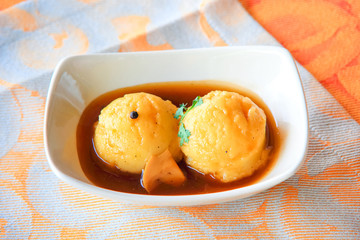 Mashed potato with gravy poured over