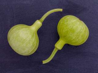 Halved bottle gourd,calabash gourd ,flowered gourd on wooden
