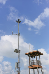 Beach Guard, Lifesaver patrol tower with cloud blue sky.