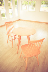 wooden chair, table in a room with filter effect retro vintage style