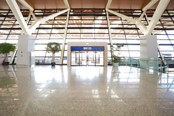 Modern airport interior glass wall aisle window and door