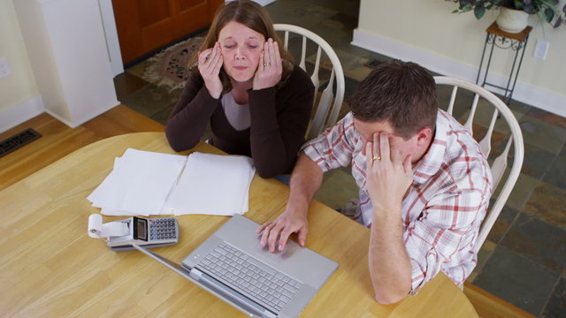 Couple stressed about bills and finances