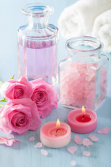 Obraz na płótnie Canvas spa aromatherapy with rose flowers perfume and herbal salt