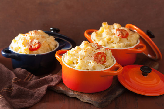 baked macaroni with cheese in orange casserole