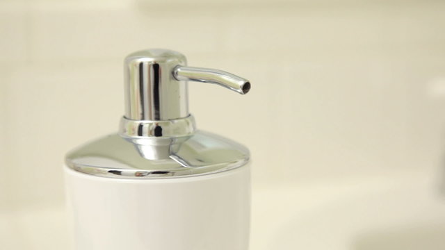 Washing hands in sink