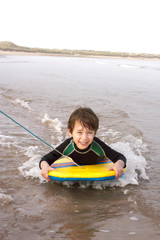 Obraz premium Boy Bodyboarding