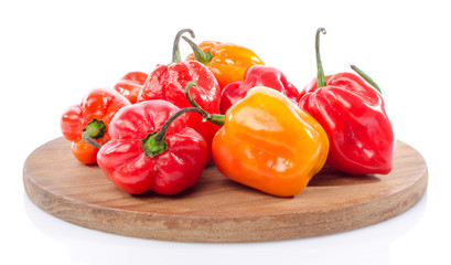 Fresh habanero peppers on cutting board