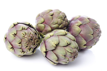 Fototapeta premium Fresh green purple artichokes