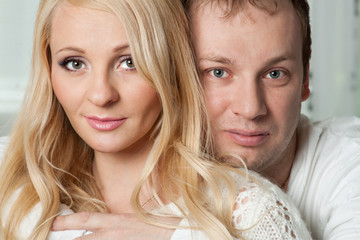 Closeup portrait of beautiful young couple.