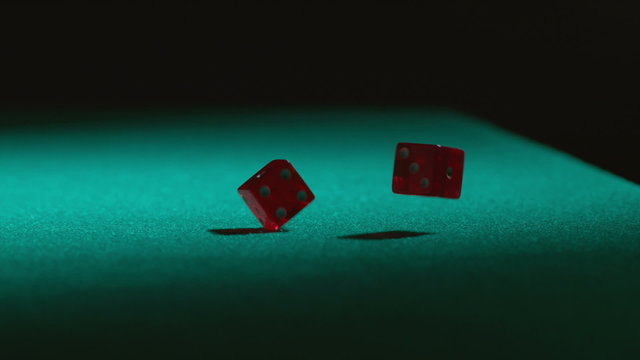 Rolling dice in slow motion