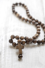 Wooden rosary beads and cross