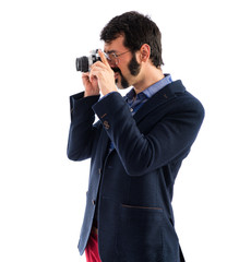 Vintage young man photographing