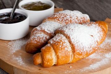 fresh croissants with jam for breakfast