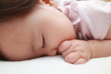 Sleeping Japanese baby girl (0 year old)