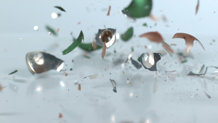 Christmas ornaments breaking in slow motion