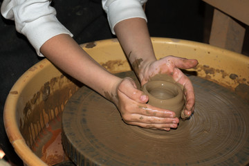 the clay pot is made children's hands  
