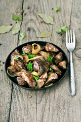 Roasted chicken liver in frying pan
