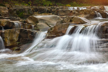 Obraz premium mountain river at autumn time
