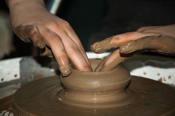 the clay pot is made children's hands  