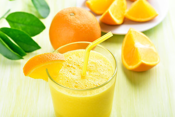 Orange smoothie in glass