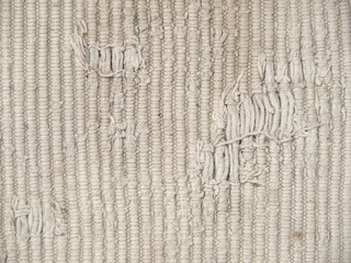 The rough dirty knit fabric texture.