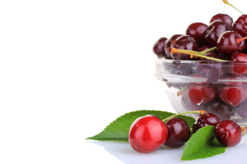 Sweet cherries in a bowl isolated