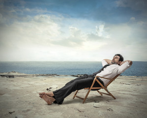 Employee relaxing at the beach