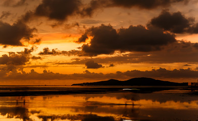 atmosphere at sunrise on the beach