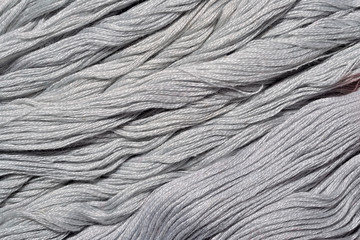 Gray embroidery floss as background texture