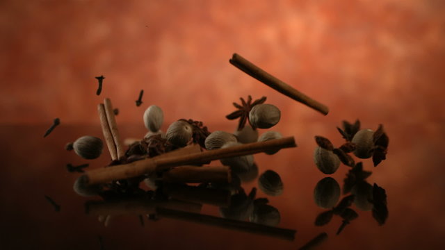 Spices falling, slow motion