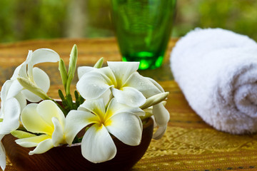 flower in wooden bowl