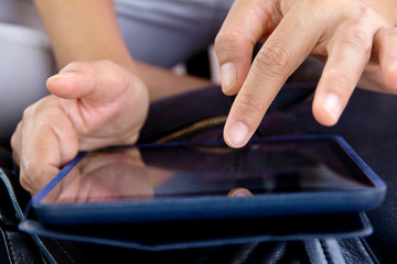  Woman using digital tablet 