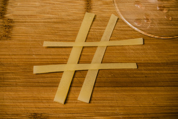 Cheese sharp on a bamboo cutting board (#)