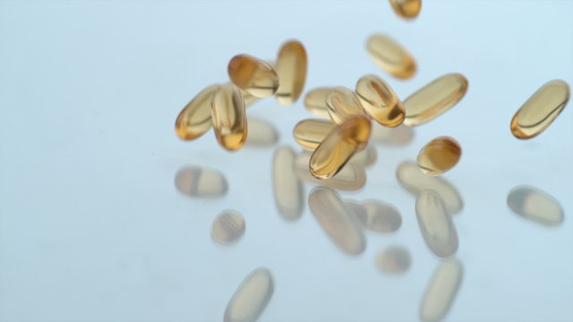 Vitamins falling in slow motion