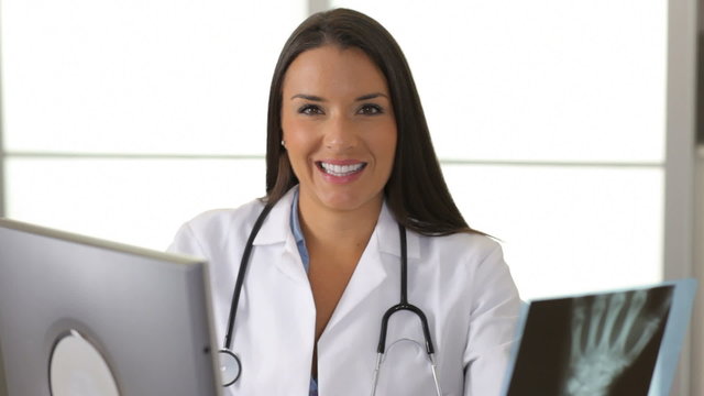 Portrait of happy female doctor