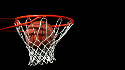 Basketball falls into hoop, slow motion